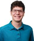 A headshot of Business Honors student, Ethan.